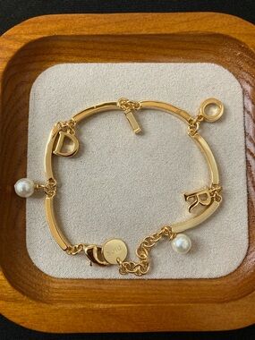 Dior Gold-Tone Charm Bracelet with Faux Pearls